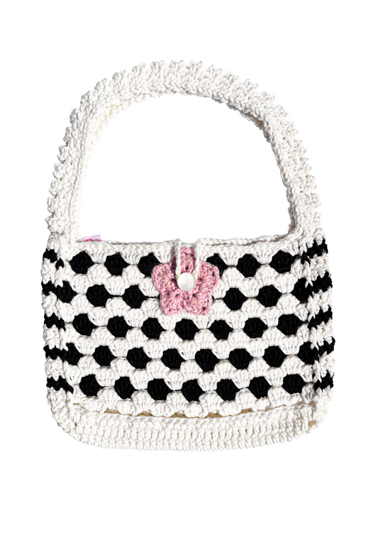 Sac à main en crochet motif polka dot.